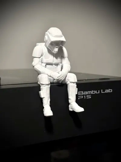 Sad Scout Trooper sitting on a ledge Figurine!
