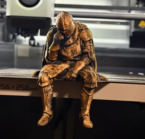 Sad Knight sitting on a ledge Figurine!