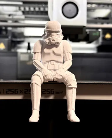 Sad Storm Trooper sitting on a ledge Figurine!