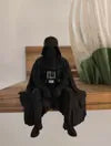 Sad Darth Vader sitting on a ledge figurine!