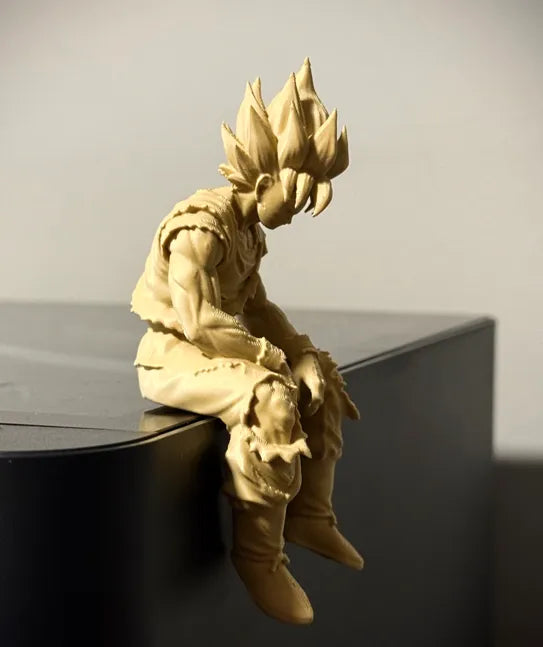 Sad Goku Figurine Sitting on a ledge!