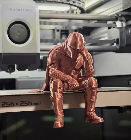 Sad Mandalorian on a ledge Figurine!