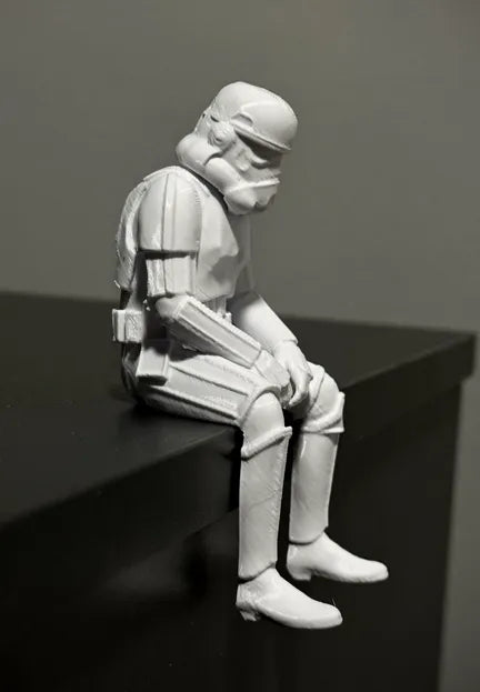 Sad Storm Trooper sitting on a ledge Figurine!