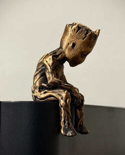 Sad Groot Figurine sitting on a ledge!