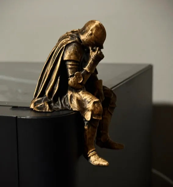 Sad Knight sitting on a ledge Figurine!