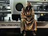 Sad Grim Reaper sitting on a ledge Figurine!