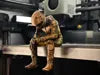 Sad MotoGP Rider on a ledge Figurine!