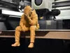 Sad Soldier sitting on a ledge Figurine!