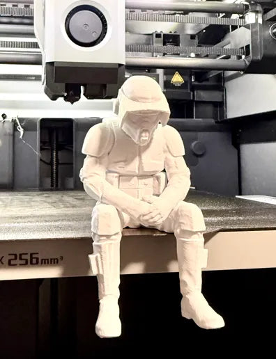 Sad Scout Trooper sitting on a ledge Figurine!