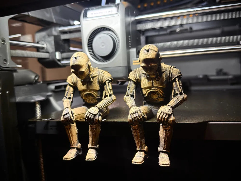 Sad C-3PO Star Wars Figurine sitting on a ledge!