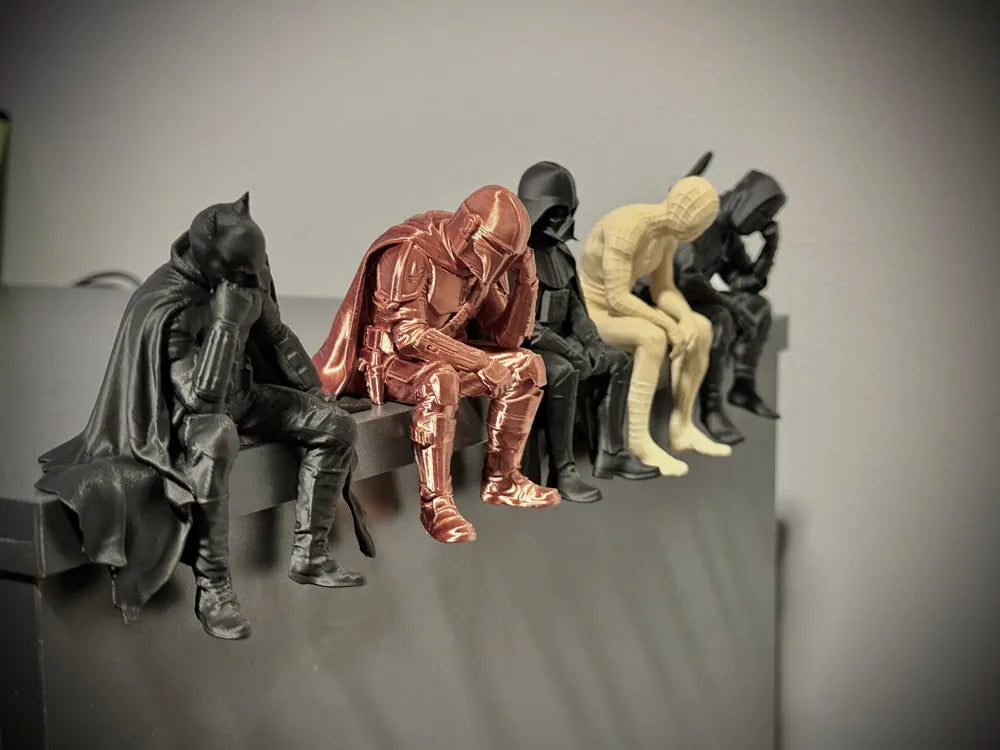Sad Mandalorian on a ledge Figurine!