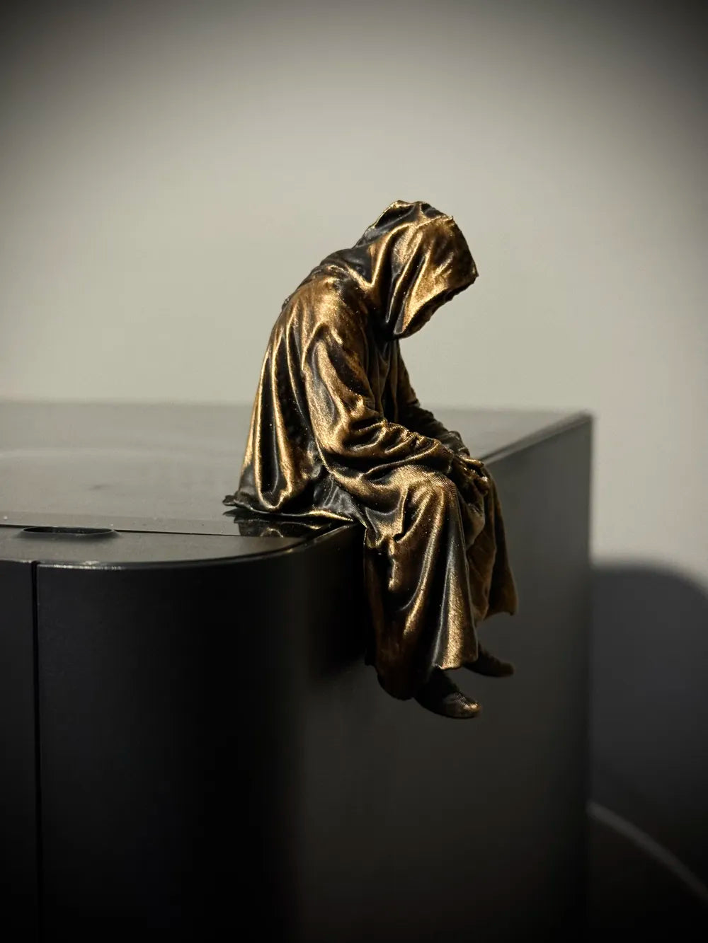 Sad Grim Reaper sitting on a ledge Figurine!