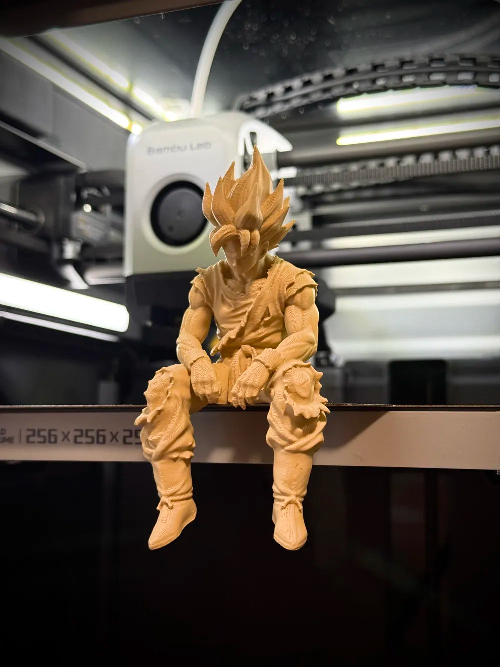 Sad Goku Figurine Sitting on a ledge!