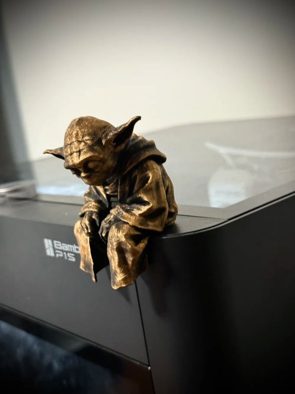 Sad Yoda Figurine on a Ledge!