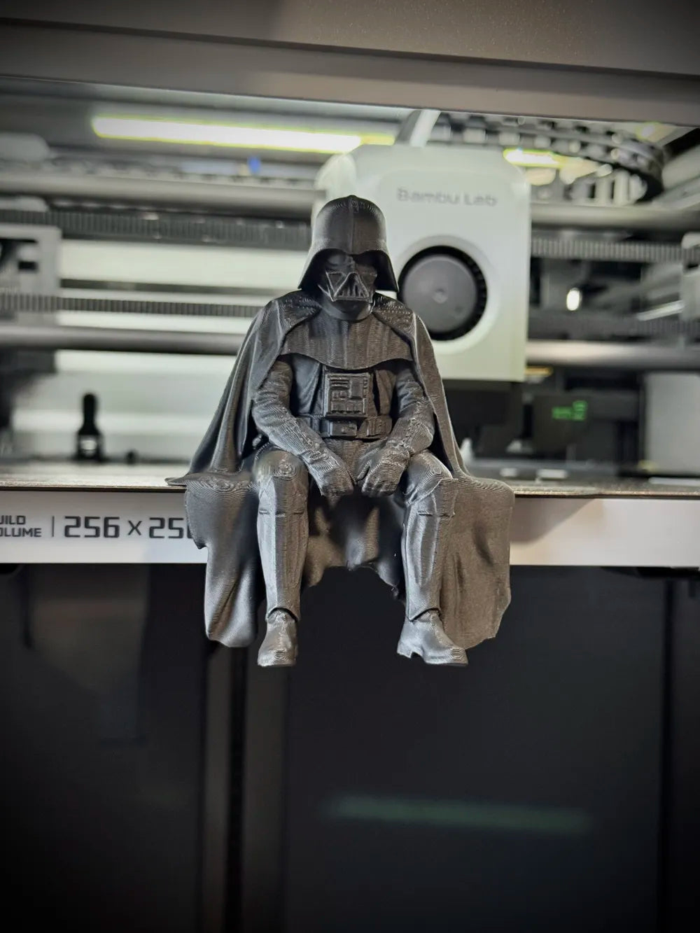 Sad Darth Vader sitting on a ledge figurine!