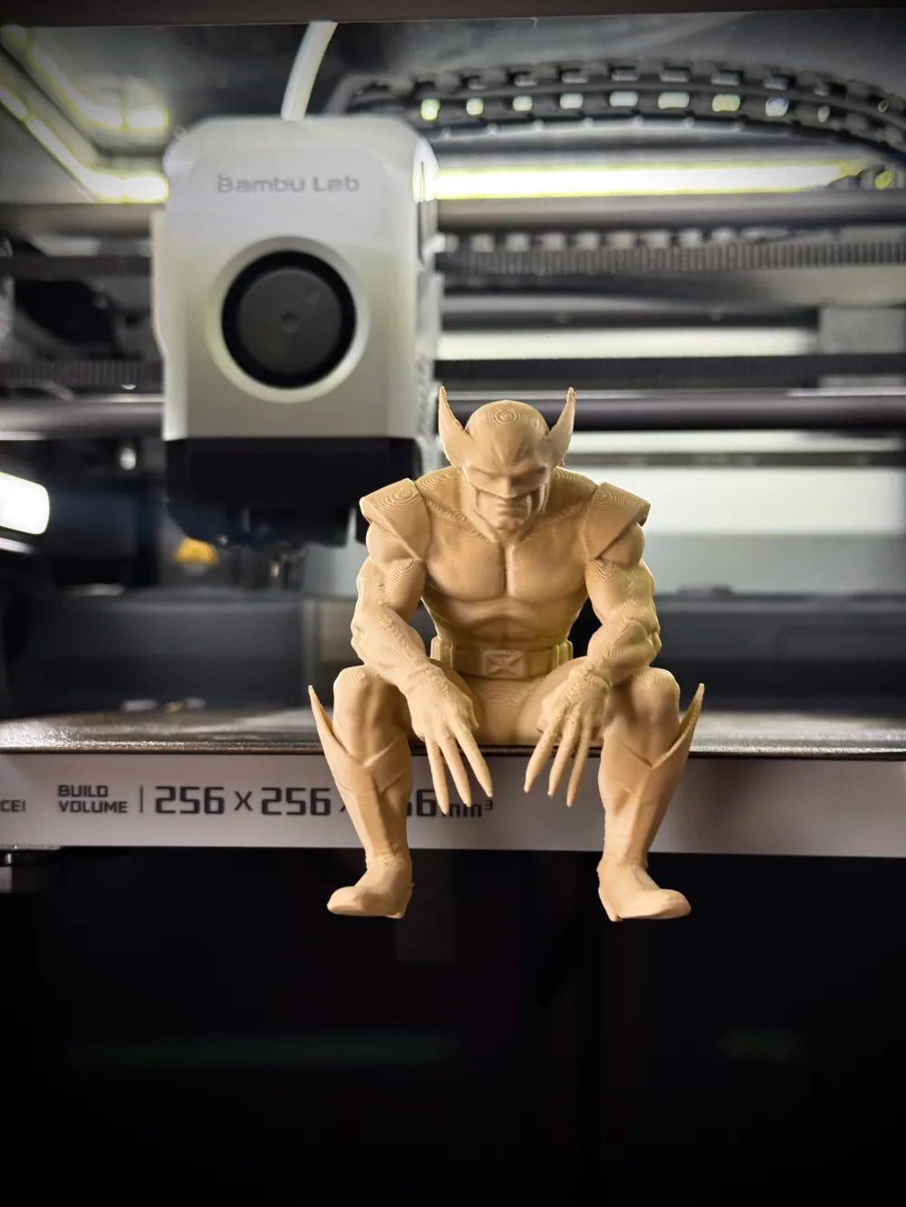 Sad Wolverine sitting on a ledge figurine!