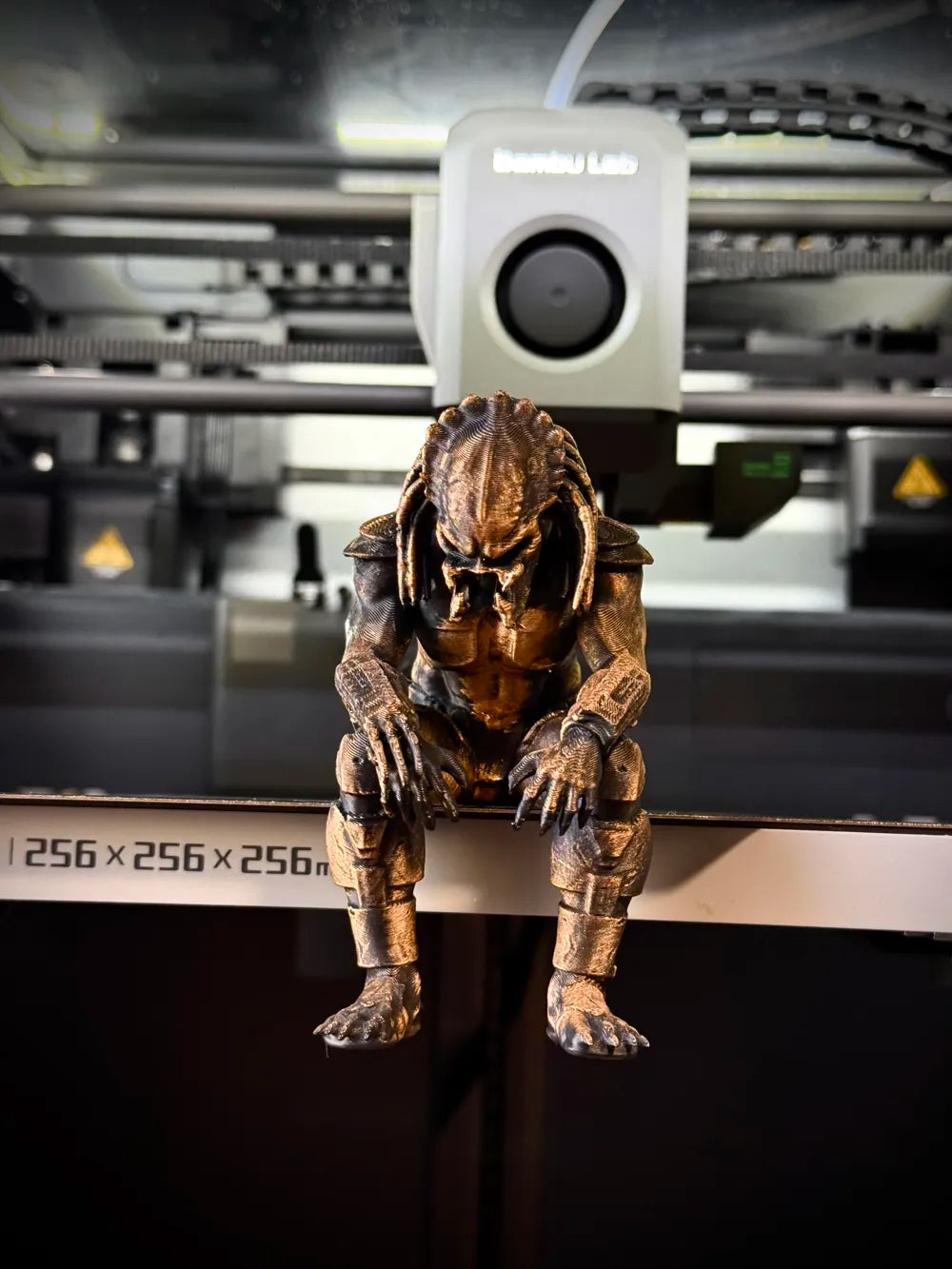 Sad Predator Figurine sitting on a ledge!