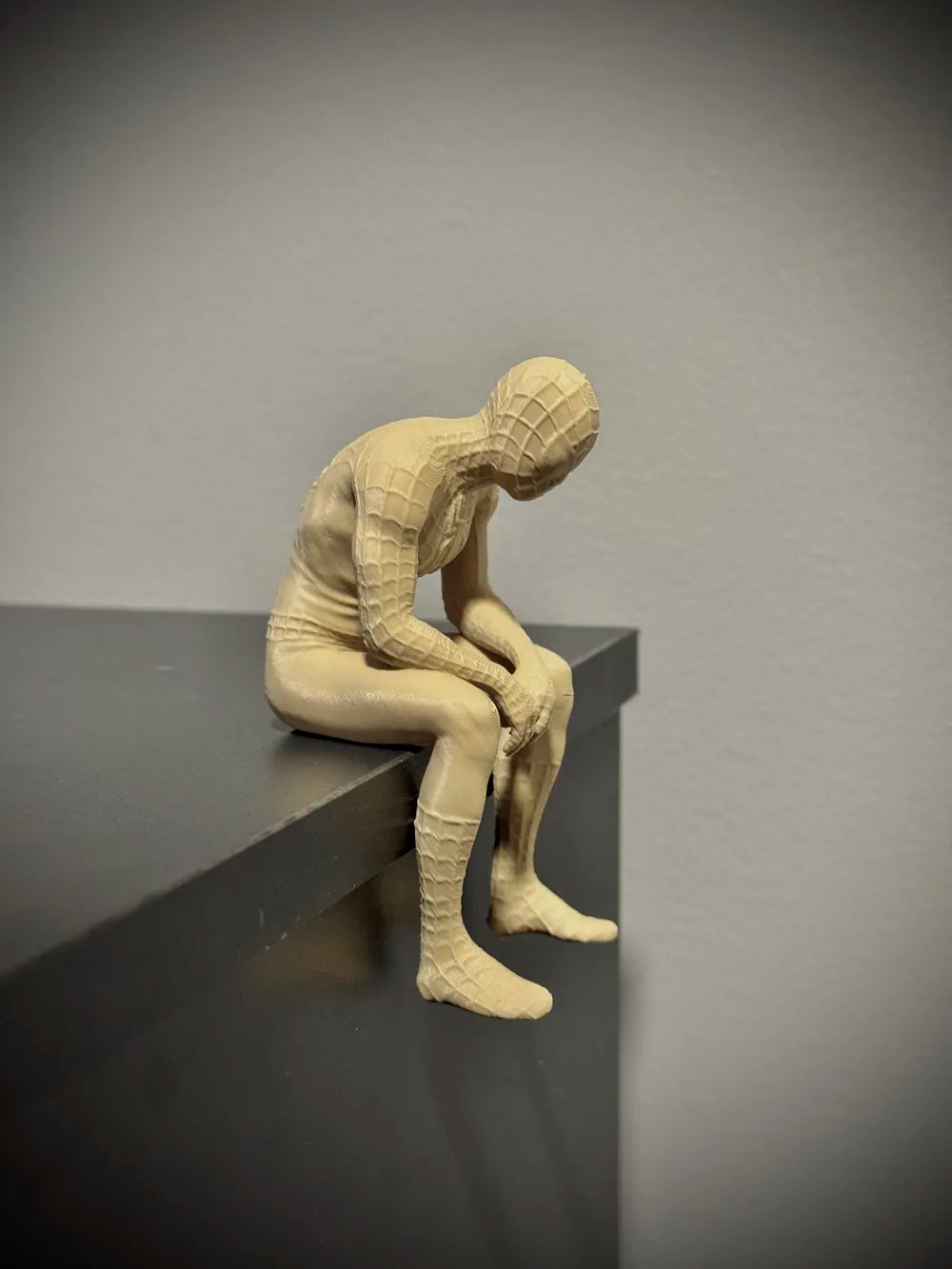 Sad Spiderman Sitting on a Ledge Figurine!