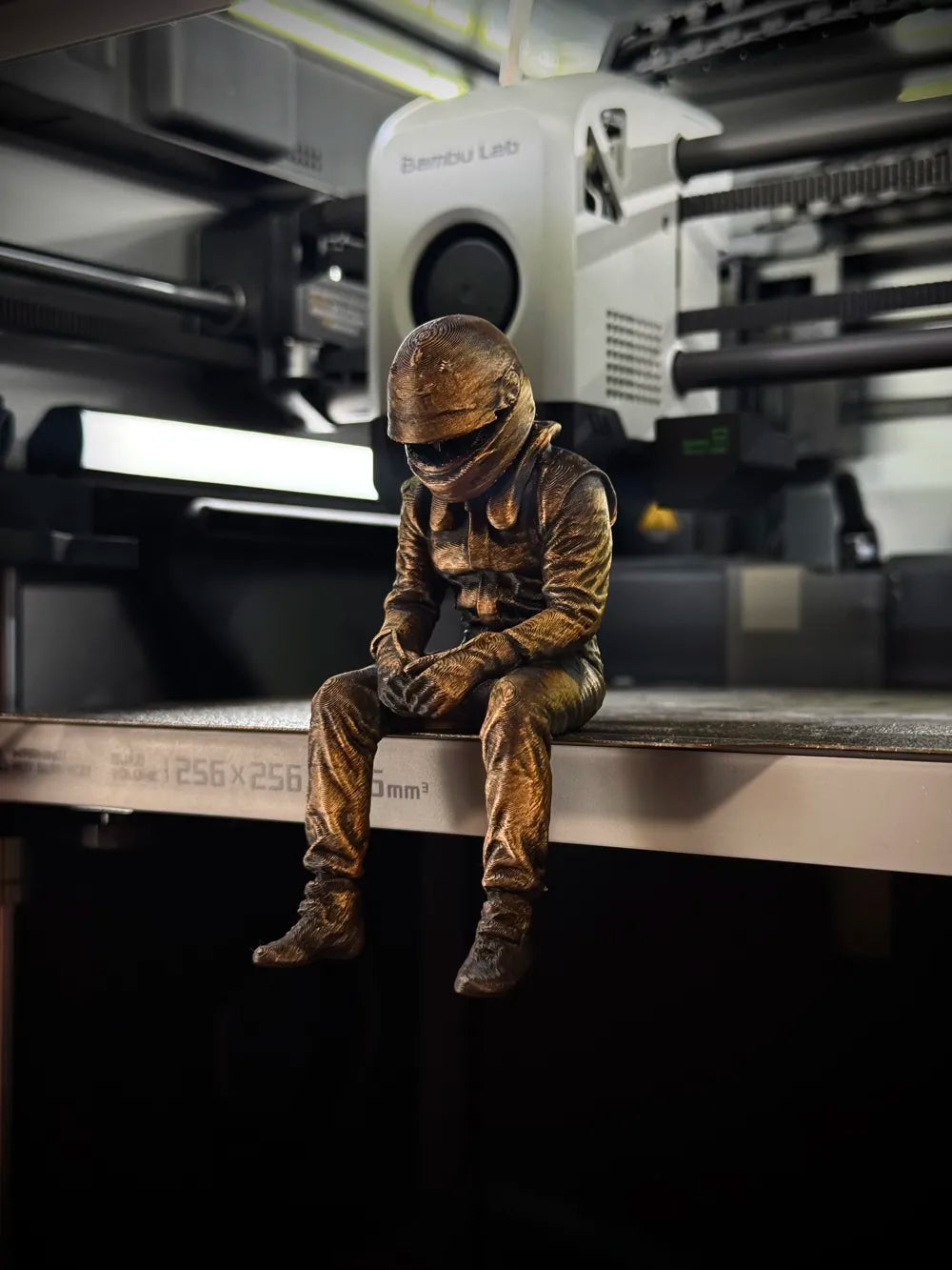 Sad F1 Driver Sitting on a ledge Figurine!
