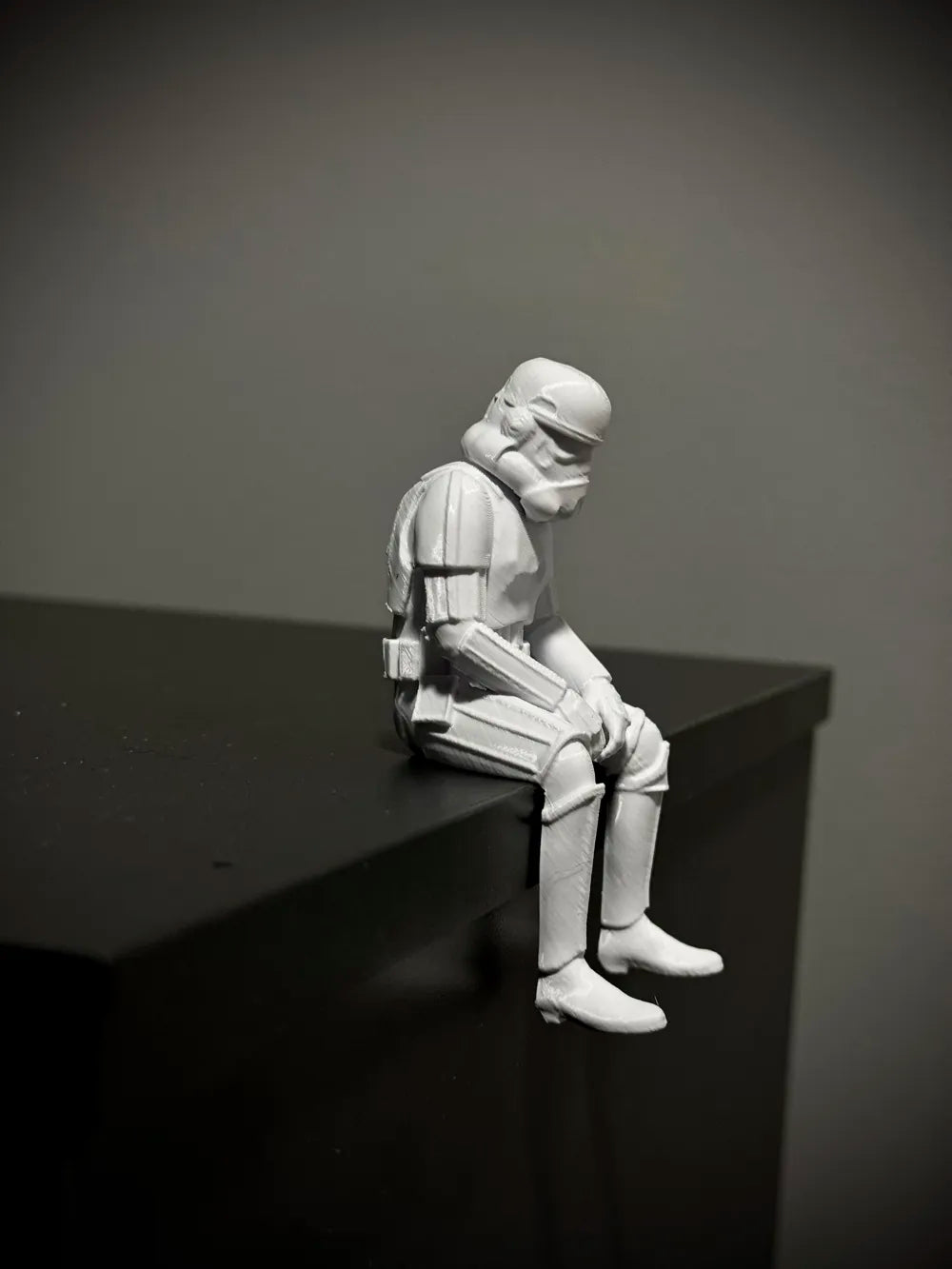 Sad Storm Trooper sitting on a ledge Figurine!