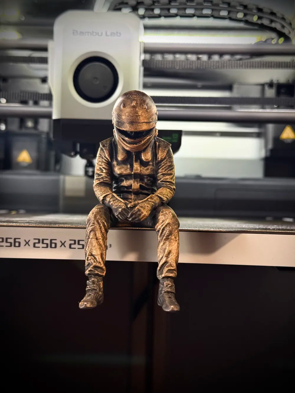 Sad F1 Driver Sitting on a ledge Figurine!