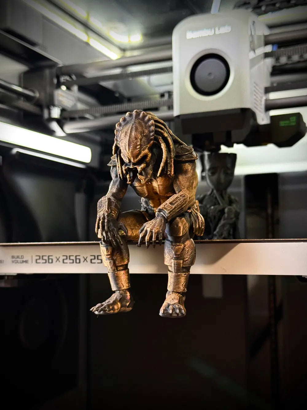 Sad Predator Figurine sitting on a ledge!