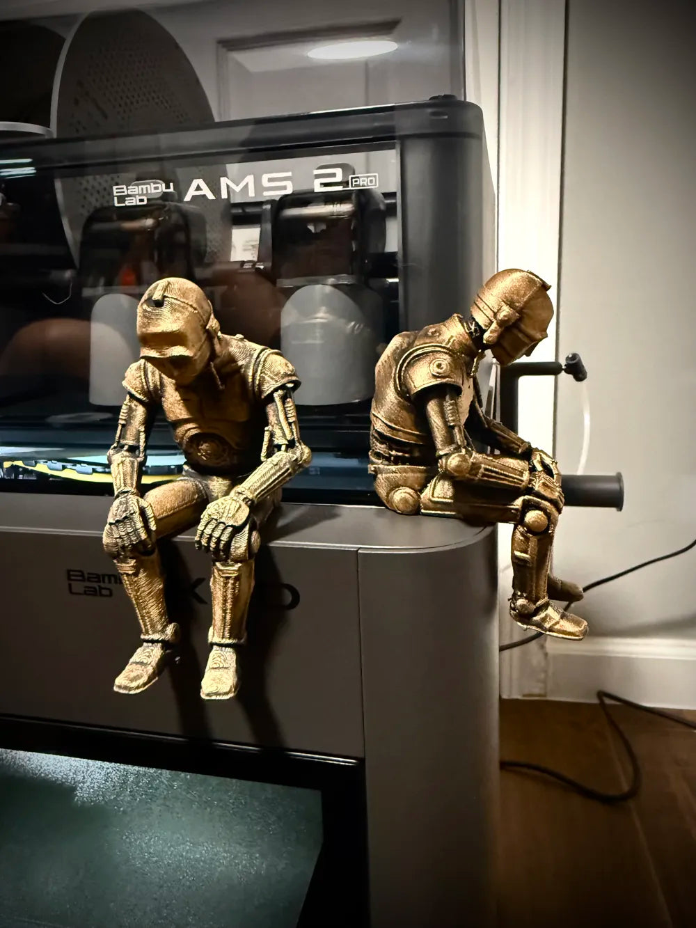 Sad C-3PO Star Wars Figurine sitting on a ledge!