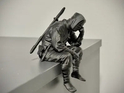 Sad Ninja sitting on a ledge Figurine!