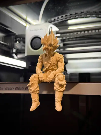 Sad Goku Figurine Sitting on a ledge!