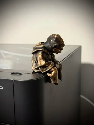 Sad Yoda Figurine on a Ledge!
