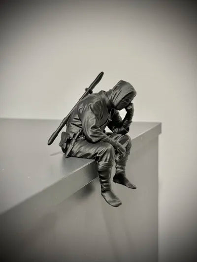 Sad Ninja sitting on a ledge Figurine!