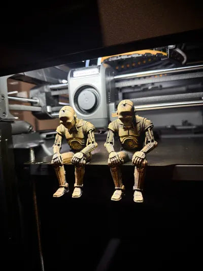 Sad C-3PO Star Wars Figurine sitting on a ledge!