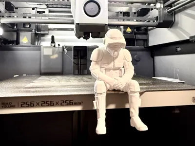 Sad Scout Trooper sitting on a ledge Figurine!