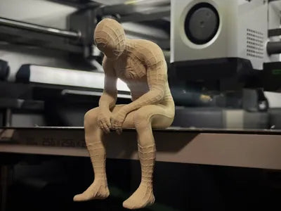 Sad Spiderman Sitting on a Ledge Figurine!