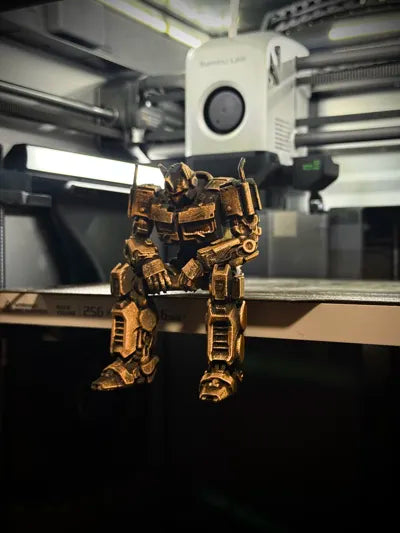 Sad Optimus Prime sitting on a ledge figurine!