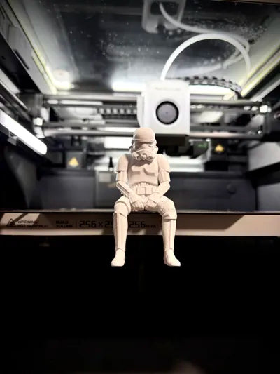 Sad Storm Trooper sitting on a ledge Figurine!