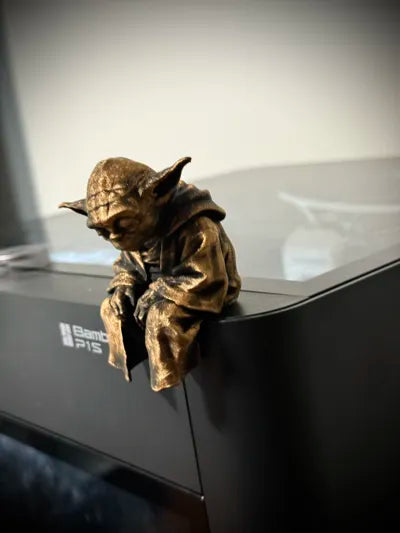 Sad Yoda Figurine on a Ledge!