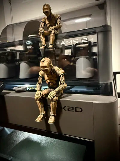 Sad C-3PO Star Wars Figurine sitting on a ledge!