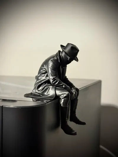 Sad Spider Noir Figurine sitting on a ledge!