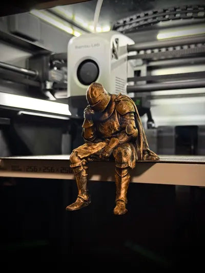 Sad Knight sitting on a ledge Figurine!