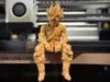 Sad Goku Figurine Sitting on a ledge!