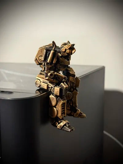 Sad Optimus Prime sitting on a ledge figurine!