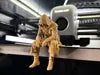 Sad Assassin's Creed sitting on a ledge Figurine