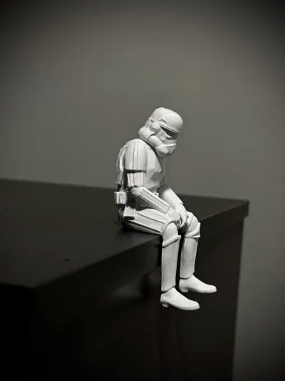 Sad Storm Trooper sitting on a ledge Figurine!