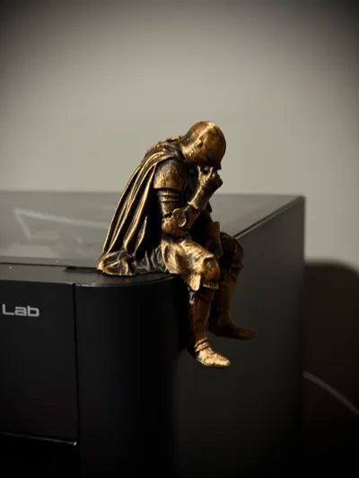 Sad Knight sitting on a ledge Figurine!