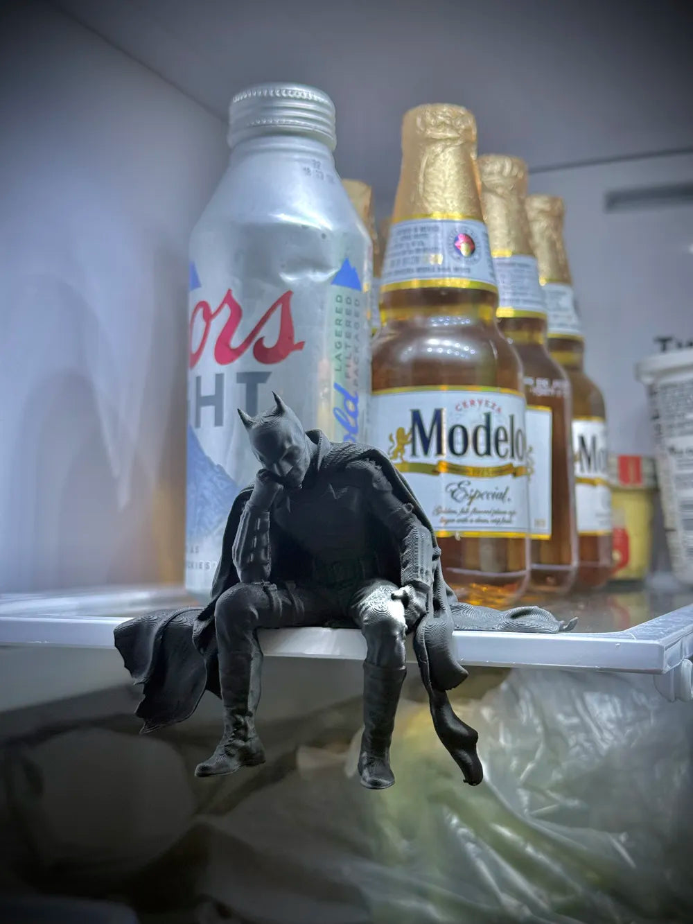 Sad Batman sitting on a Ledge Figurine!